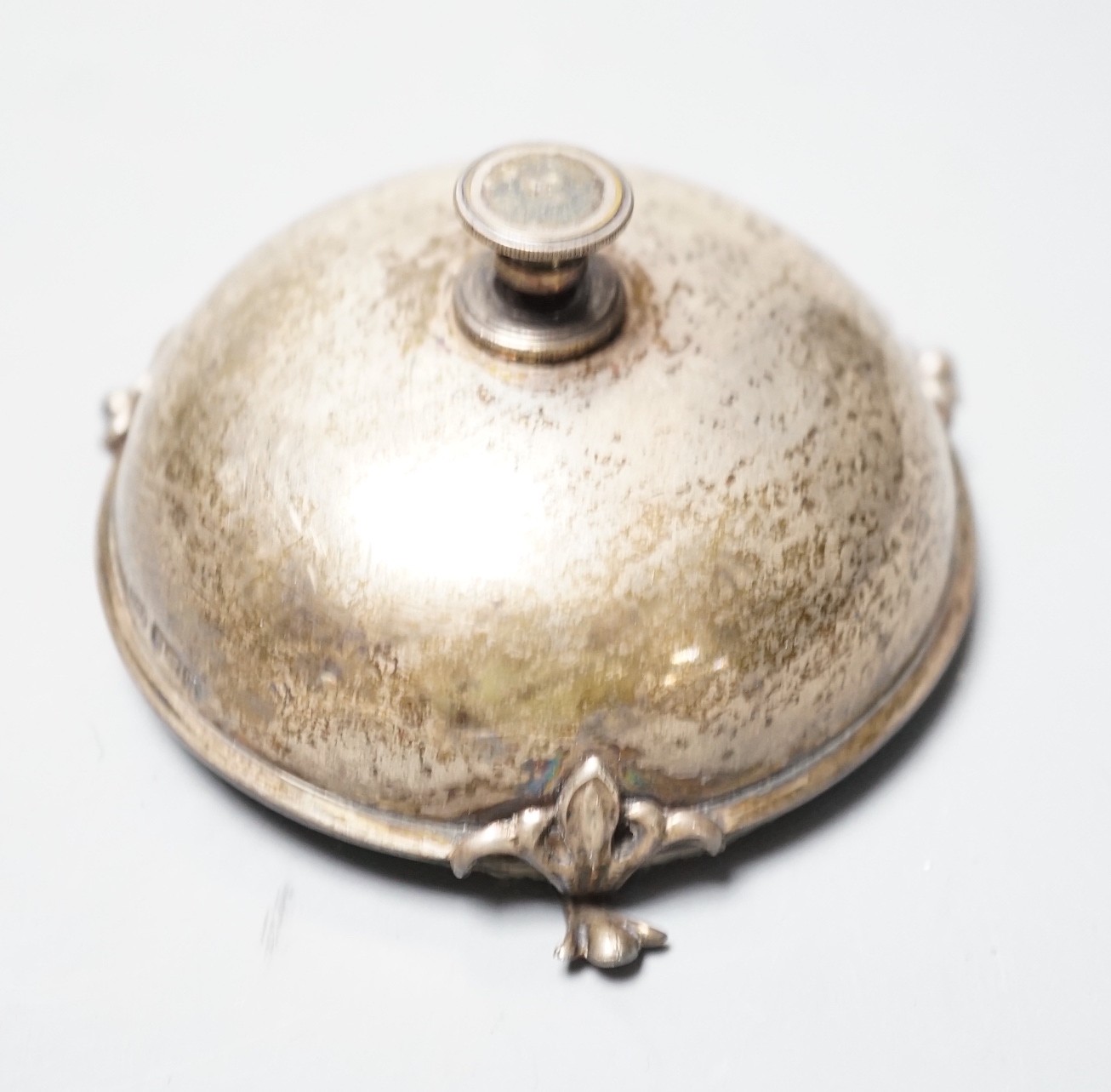 A George V silver mounted table bell, Levi & Salaman, Birmingham, 1911, diameter 86mm.